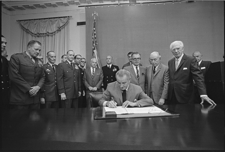 President Lyndon B. Johnson signs the Military Justice Act of 1968. (Credit: Lyndon B. Johnson Presidential Library)